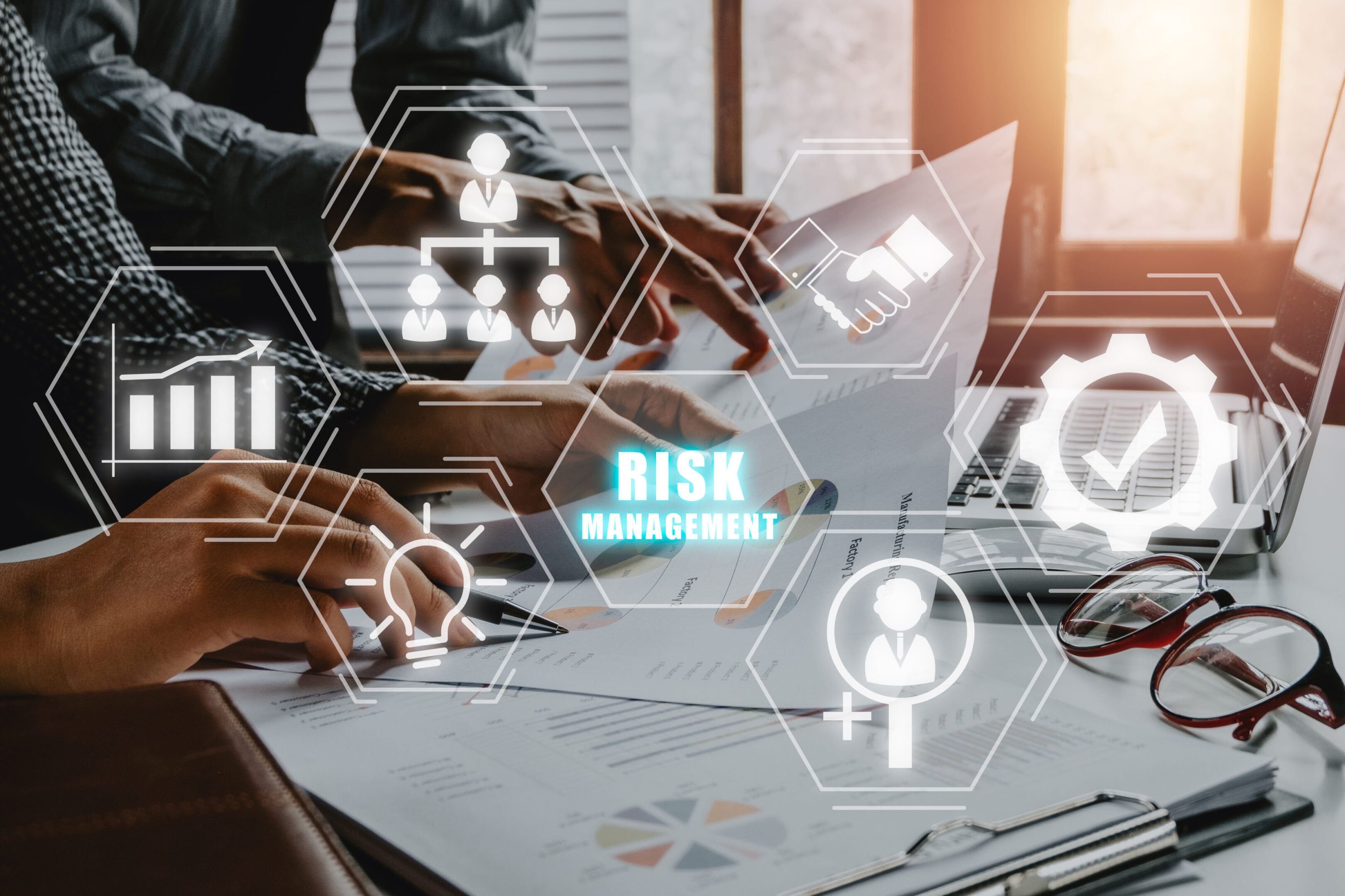 Risk management strategy plan finance investment internet business technology concept, Business team analyzing income charts and graphs with icons risk management on VR screen.